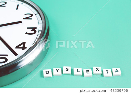 Dyslexia and read words with a big clock 48339796