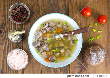 Transparent broth with chicken liver 48340024