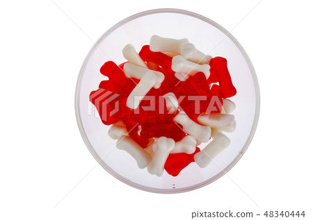 Bone shaped jelly candies on white 48340444