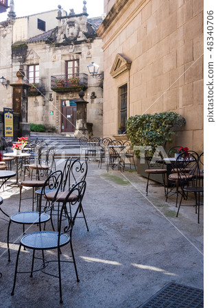 Street cafe with metal chairs in Barcelona, Spain 48340706