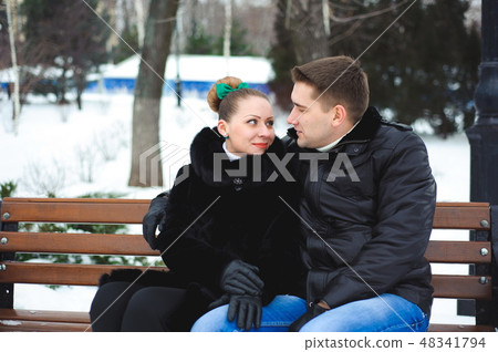 Couple in love in the winter park. 48341794