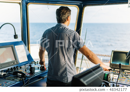 Marine navigational officer during navigational watch on Bridge 48342177