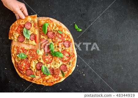 Taking Slice of Pizza Taking Slice of Pizza 48344919