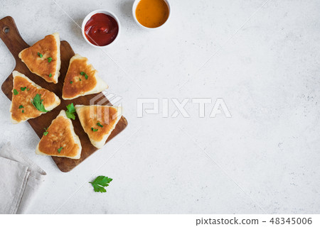 meat stuffed pies, samosas, samsa 48345006