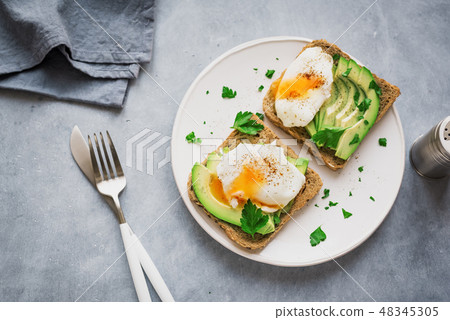 Poached Eggs and Avocado Sandwiches Poached Eggs and Avocado Sandwiches 48345305