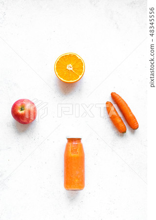 Orange smoothie bottle and ingredients Orange smoothie bottle and ingredients 48345556