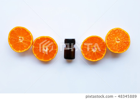 Essential oil of orange on a white background. Essential oil of orange on a white background. 48345889