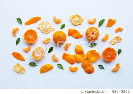 Orange fruits and green leaves on a white Orange fruits and green leaves on a white 48345891
