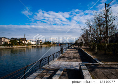 Tateyama mountain range peak from the banks of the Toyama Iwase canal 2019.02 a 48350077