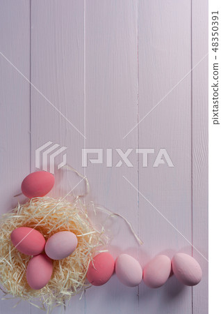 Easter background with pink eggs Easter background with pink eggs 48350391