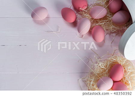 Easter background with pink eggs Easter background with pink eggs 48350392