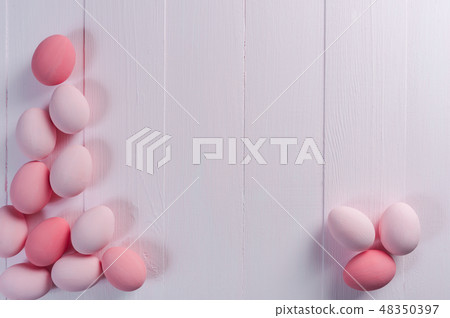 Easter background with pink eggs Easter background with pink eggs 48350397