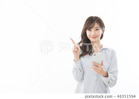 Young woman smartphone pointing finger 48351594