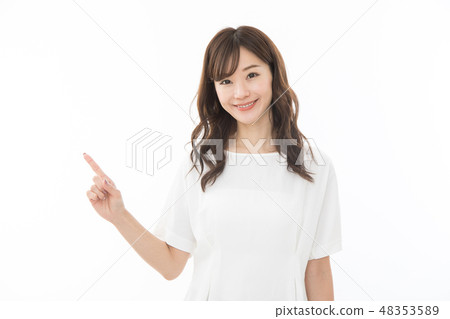 Young woman pointing Young woman pointing 48353589