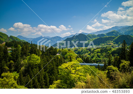 A car driving through the mountains of Chichibu A car driving through the mountains of Chichibu 48353893