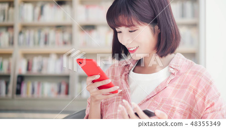 Young woman online shopping Young woman online shopping 48355349