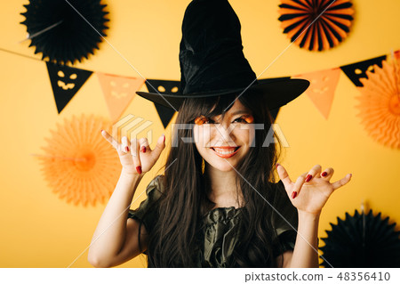 A young girl who makes a witch's cosplay in Halloween Japanese women 48356410