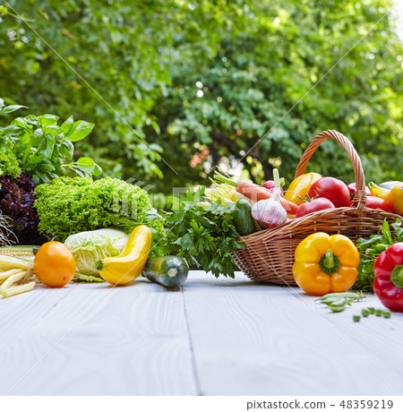 Fresh organic vegetables and fruits on wood table 48359219