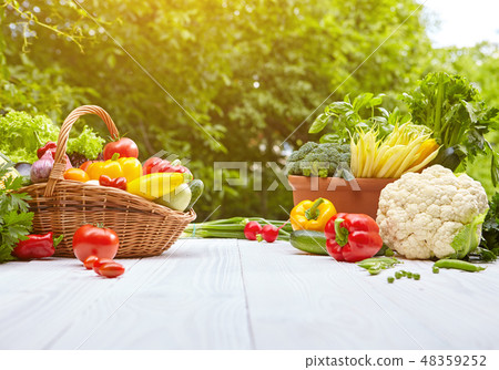 Fresh organic vegetables and fruits on wood table Fresh organic vegetables and fruits on wood table 48359252