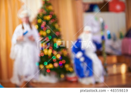 father frost and snow maiden near christmas tree father frost and snow maiden near christmas tree 48359819