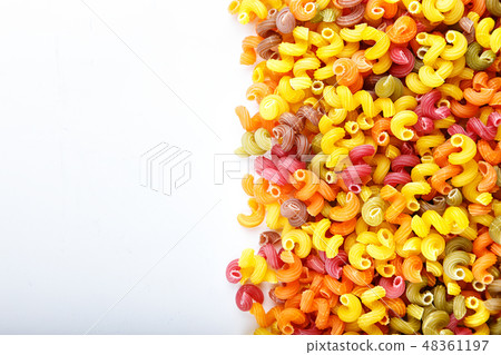 scattered colored pasta 48361197