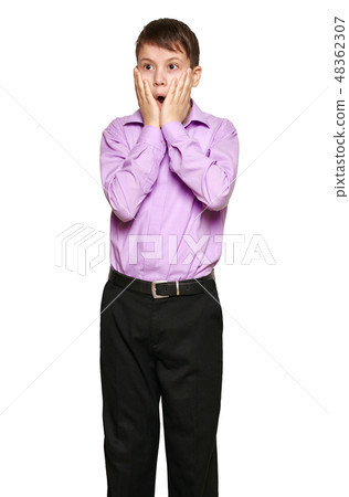 Boy posing on white background Boy posing on white background 48362307