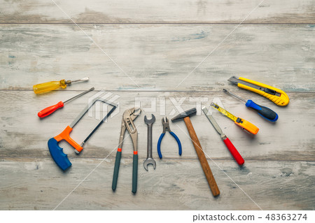 construction tools on wooden background 48363274