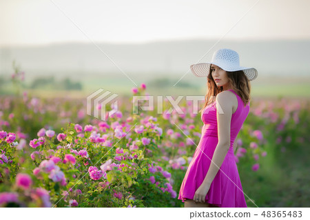 Girl in pink dress and vintage Cap 48365483