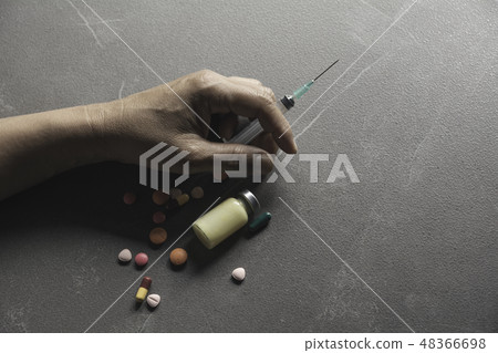 The man committing suicide by overdosing 48366698