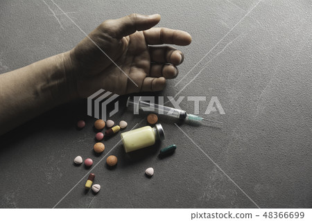 The man committing suicide by overdosing 48366699