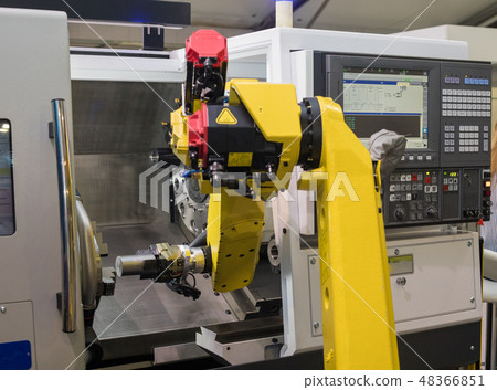 Lathe with robotic control.Machine for shaping wood, metal, or other material. 48366851
