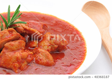 Simmered chicken with tomato sauce Simmered chicken with tomato sauce 48368187