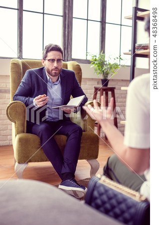 Nice handsome man working as a psychologist 48368498