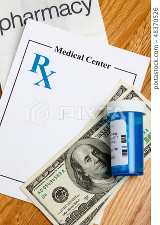 Prescription Medicine and dollar 48370526