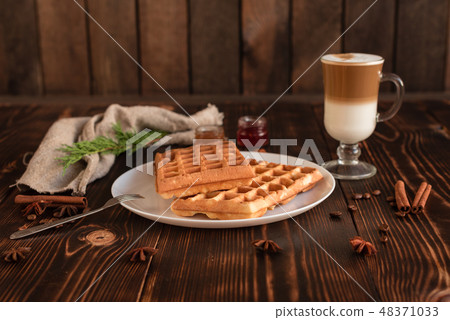 Tasty fresh Vienna wafers, jam and cup of coffee Tasty fresh Vienna wafers, jam and cup of coffee 48371033