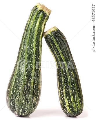 Two green zucchini isolated on white background 48371657