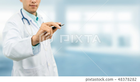 Doctor pointing pen at empty space for your text. 48378282