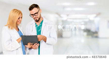 Doctors working with colleague in the hospital. Doctors working with colleague in the hospital. 48378640