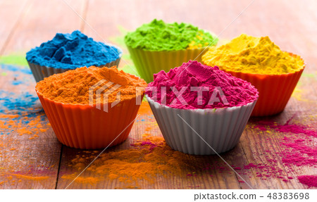 Holi color powder. Organic Gulal colours in bowl for Holi festival, Hindu tradition festive Holi color powder. Organic Gulal colours in bowl for Holi festival, Hindu tradition festive 48383698