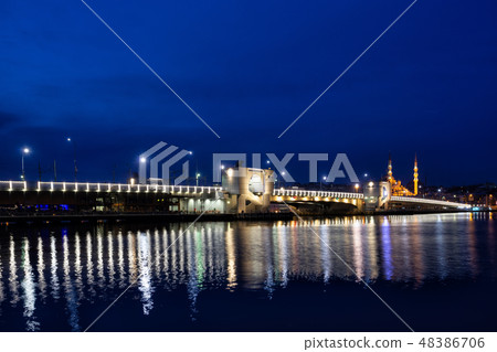 Galata Bridge lit by lights at night 48386706