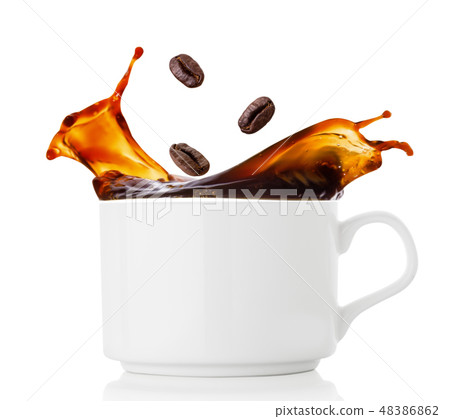Coffee beans splash in cup of coffee Coffee beans splash in cup of coffee 48386862