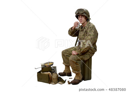 young American soldier drinking young American soldier drinking 48387080