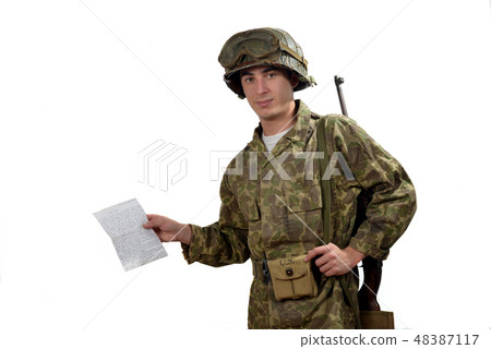 young American soldier  shows a photograph 48387117