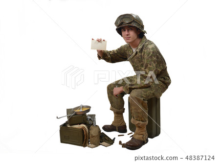 young American soldier shows a photograph 48387124