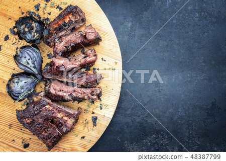 Barbecue caveman spare ribs St Louis  48387799
