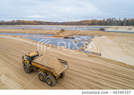 the construction of the landfill and installation of geomembrane the construction of the landfill and installation of geomembrane 48390197