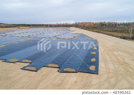 the construction of the landfill and installation of geomembrane the construction of the landfill and installation of geomembrane 48390262