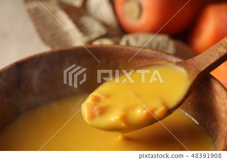 Another warm steaming carrot potage soup 48391908