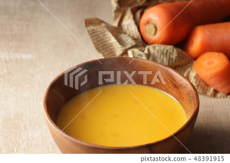 Another warm steaming carrot potage soup Another warm steaming carrot potage soup 48391915