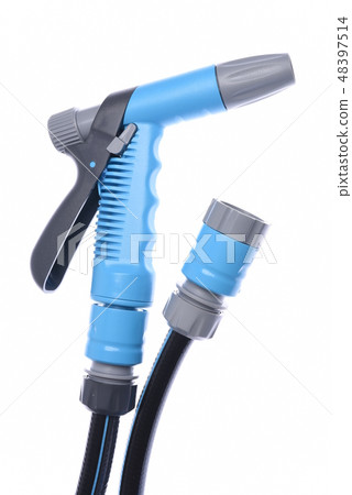 Garden hose with nozzle isolated on white 48397514